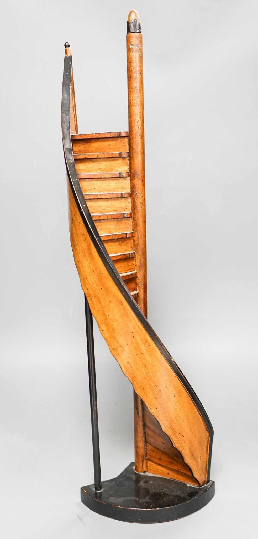A reproduction fruitwood model spiral staircase 62cm